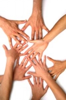 Hands together in a group