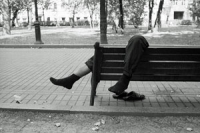 Rough sleeper on bench