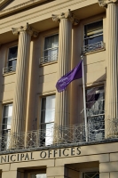 Purple flag flying outside the muni