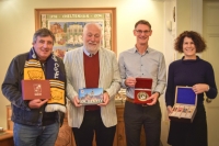 Image of twinning officers and members with photos and certificates