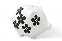 White piggy bank with black flower design