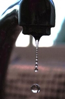 A tap with water dripping
