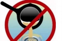 An illustration of a saucepan with oil in being poured down a plughole - a warning sign across it suggesting not to do it