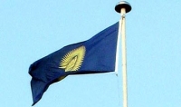 Commonwealth flag flying from a flag pole