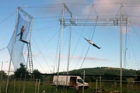 image of man on flying trapeze