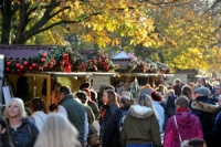 People shopping at a market in Cheltenham at Christmas